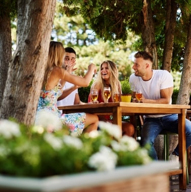 Homepage-Visit people enjoying outdoor meal